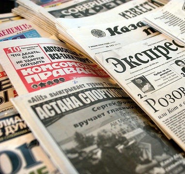 Russian and Kazakh language newspapers and magazines are displayed at a newsstand in Astana, Kazakhstan, on June 7, 2006.